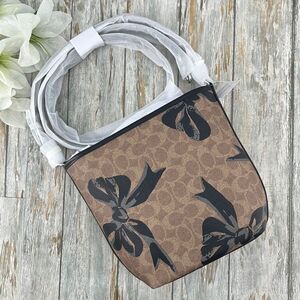 Coach City Bucket Bag Crossbody In Signature Canvas With Bow Print Purse